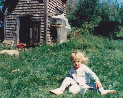Child Playing with Rabbit