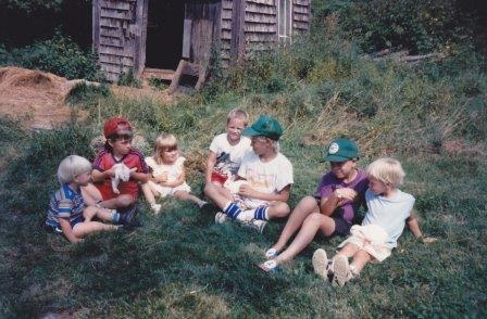 Children Playing with Rabbits